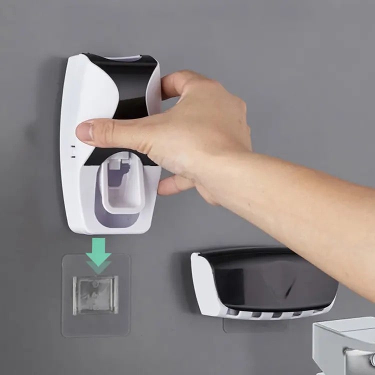 Toothpaste distributor and toothbrush holder - ToothpasteDistributor™