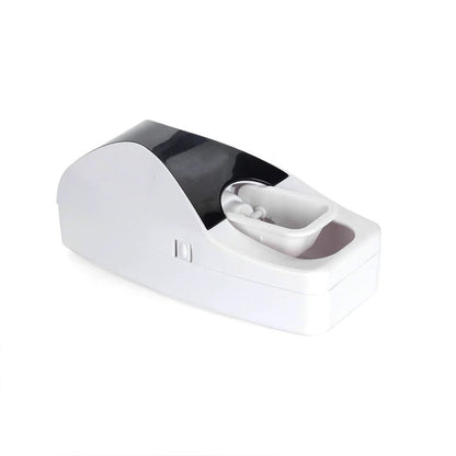 Toothpaste distributor and toothbrush holder - ToothpasteDistributor™