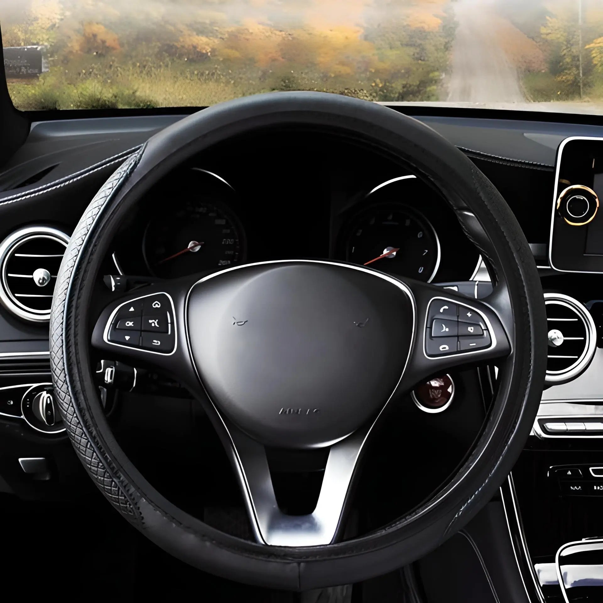 Housse de volant CarStyle™ en cuir noir ajoutant une touche de style à l'intérieur de la voiture